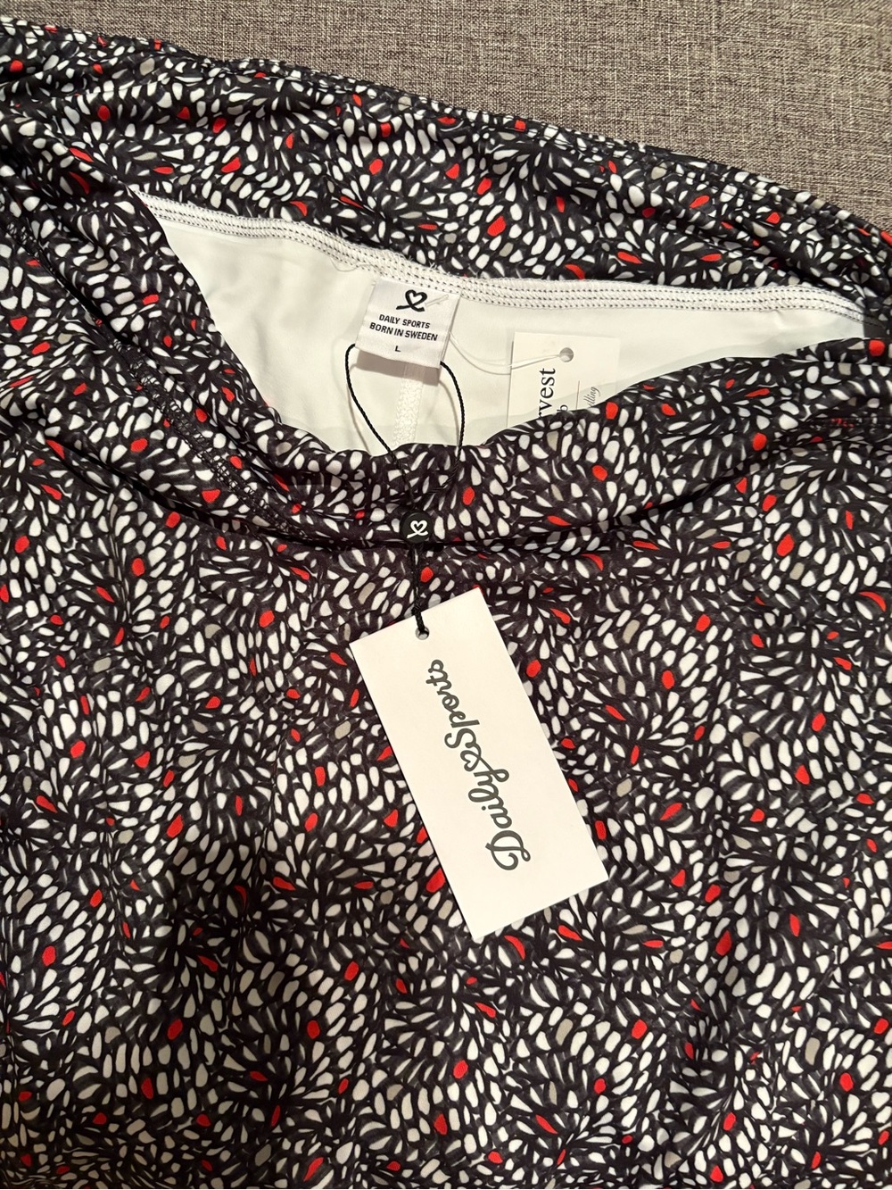 Daily Sports Black Golf Skirt with White and Red Leaf Motif